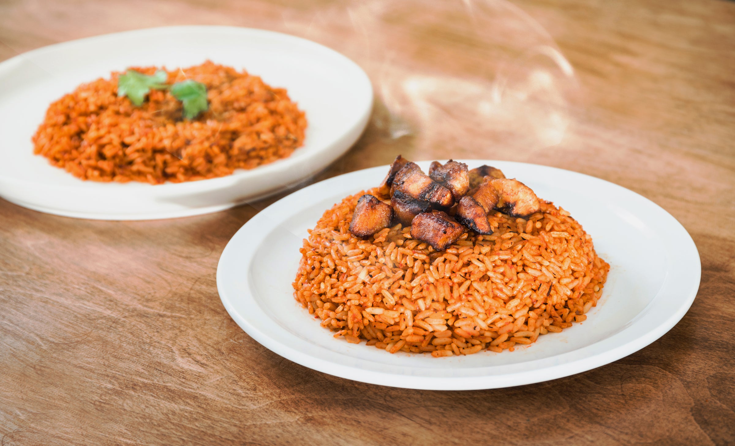 Smoky Party Jollof on a wooden table